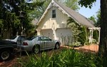 Plenty of parking for all three suites surrounded by gardens & pine trees.
