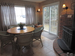 Dining room with wood burning fireplace